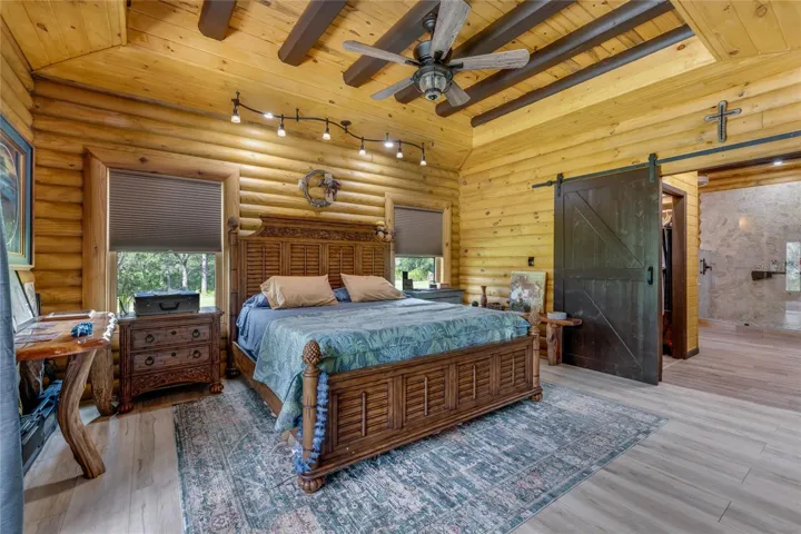 Primary bedroom suite is located on the first floor