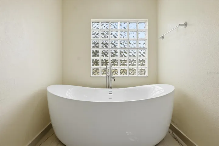 jetted soaker tub: primary bathroom