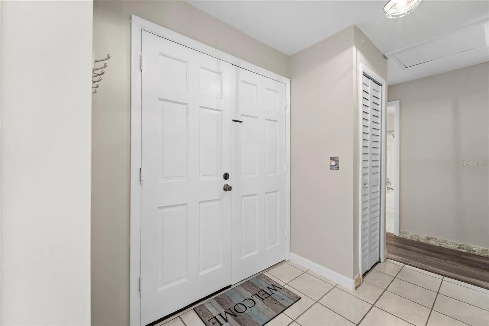Inside the front door...showing a nearby closet