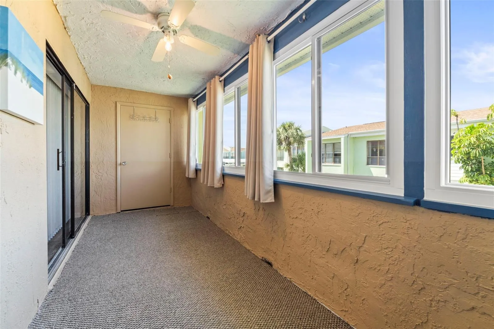 Another view of the back porch...i.e. Florida room...contains new windows