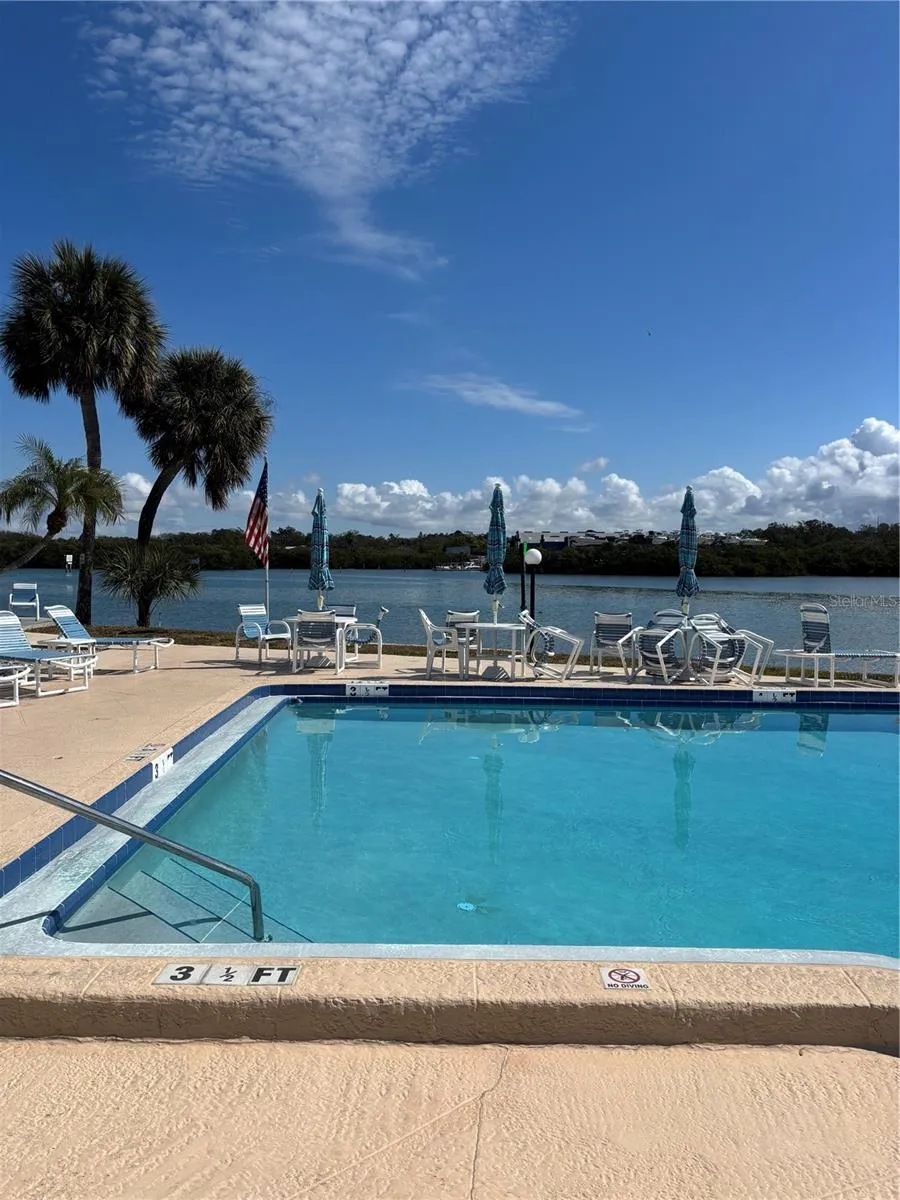 Beautiful pool area in this complex overlooks the intracoastal waterway