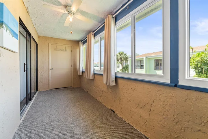 Another view of the back porch...i.e. Florida room...contains new windows