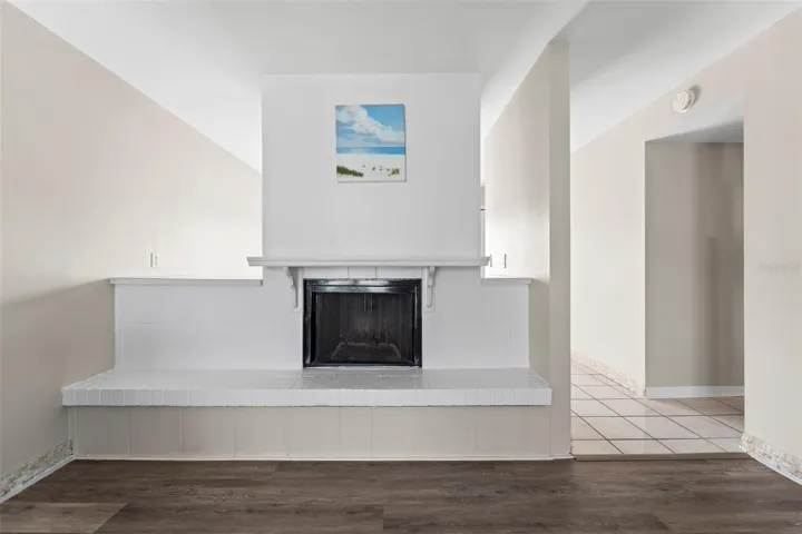 Living room complete with new flooring....and cozy fireplace