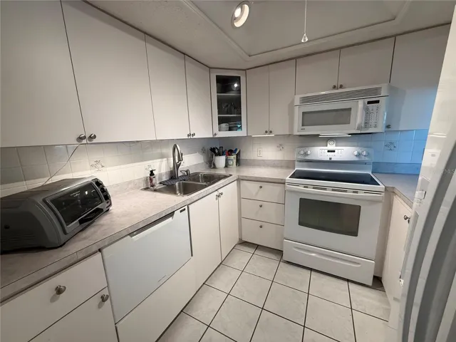 Kitchen with dishwasher. Appliances included.