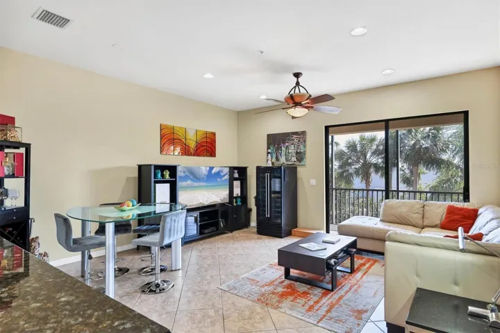 Great room with sliders to the screened lanai