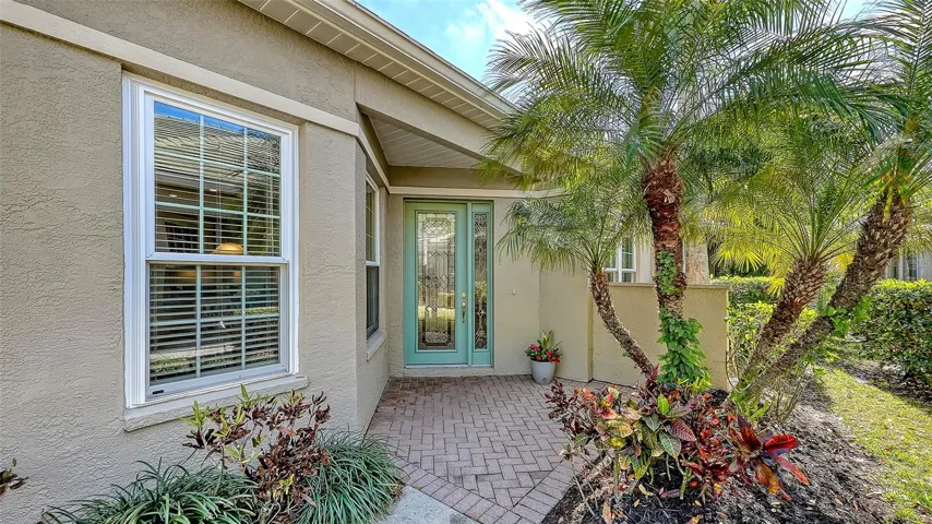 4906 Lakescene Place Front Door with beautiful landscaping