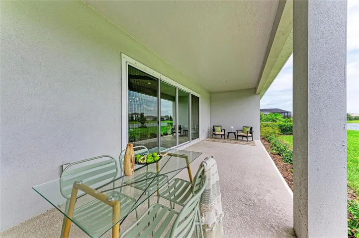 Covered outdoor living space designed for year-round Florida enjoyment