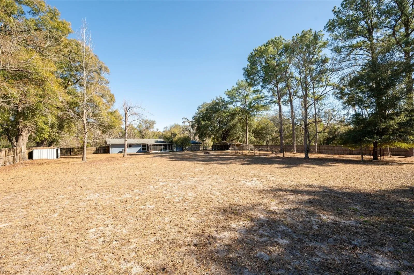 Completely fenced 1 acre
