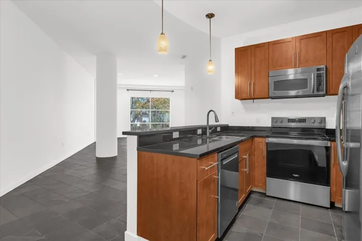 Open kitchen overlooking spacious living area