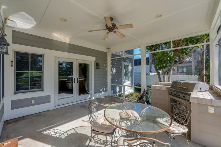 Screened in lanai with outdoor kitchen