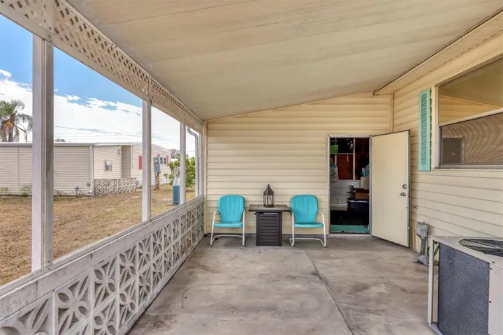 Open covered patio off of garage