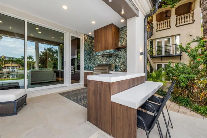 outdoor oasis, with outdoor kitchen