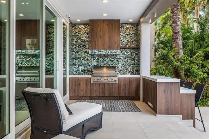 outdoor oasis, with outdoor kitchen