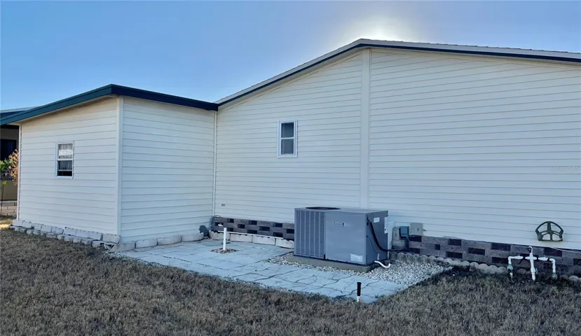 AC on pavered patio