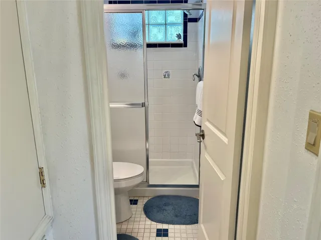 Bath with step-in shower