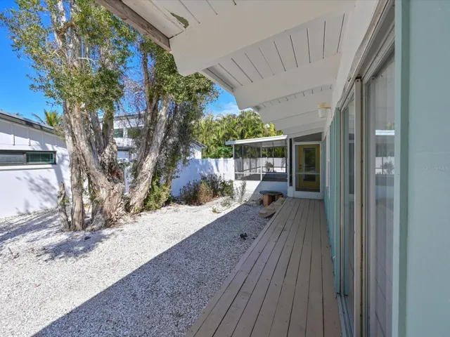 Side Porch leads to Front and Back Porches