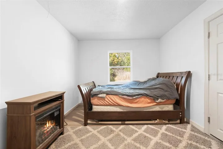 BR 5-3, door on right to garage, (out of frame: closet directly behind you, hallway door to left).