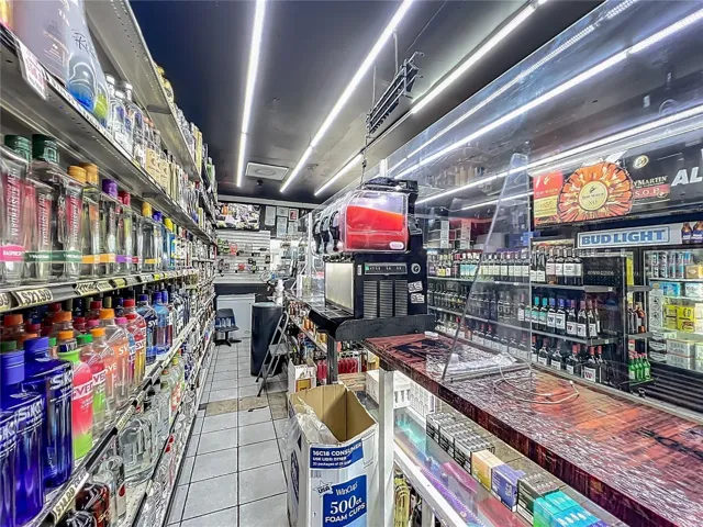 Secure Glass-Enclosed Liquor Inventory Area 7