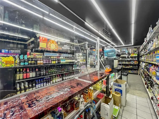 Secure Glass-Enclosed Liquor Inventory Area 8