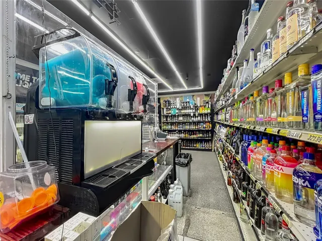 Secure Glass-Enclosed Liquor Inventory Area 9