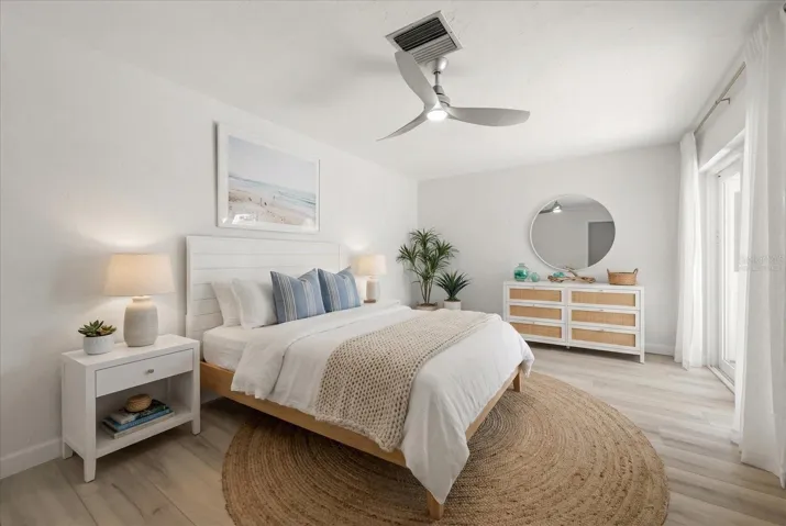 2nd Bedroom - Virtually staged - large room with 2 closets