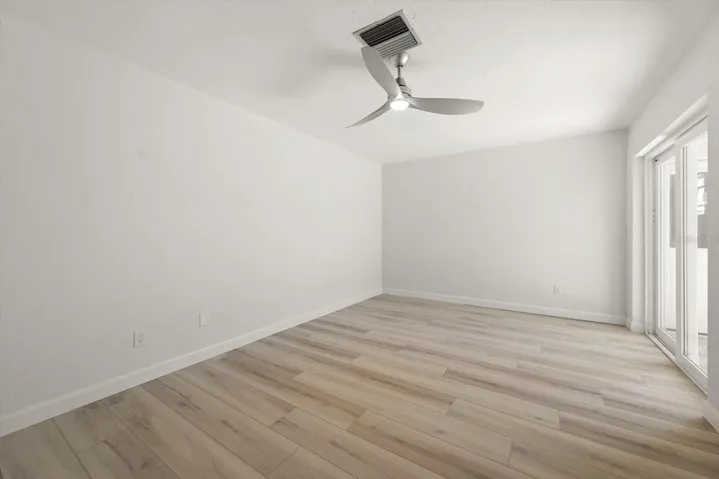large 2nd bedroom, nice and bright with sliders to front patio