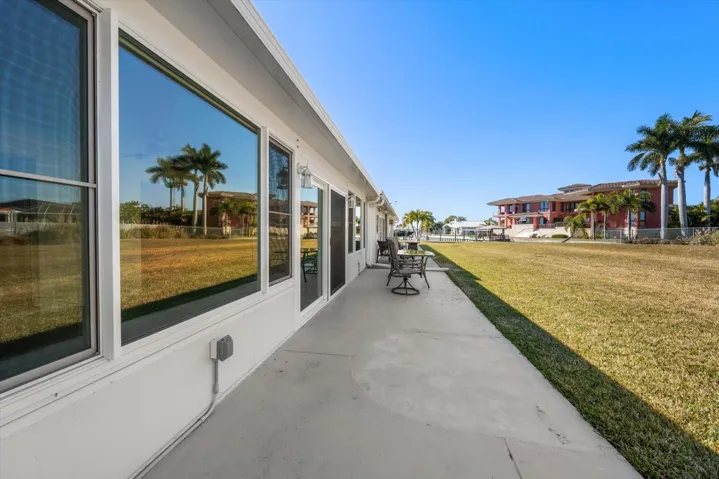 Rear patio with views of the waterway and amazing sunsets