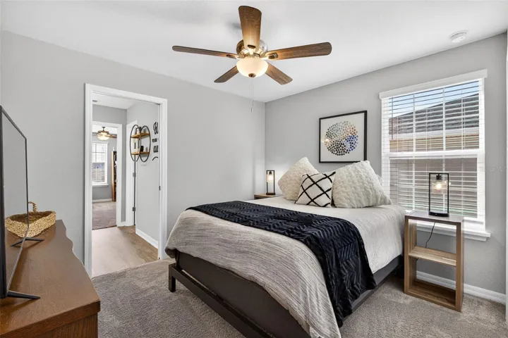 Bedroom 3 offers upgraded ceiling fan