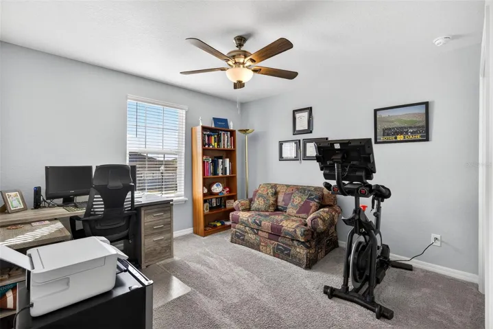 Bedroom 2 offers upgraded ceiling fan