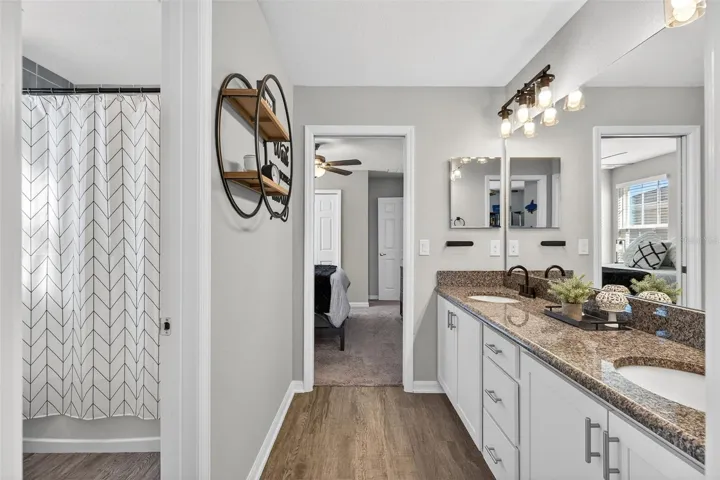 Bathroom 2 is jack-n-jill bathroom located between bedroom 2 &amp; bedroom 3.  It features double sink vanity with granite counter top. Tub/shower combination with toilet in private area.