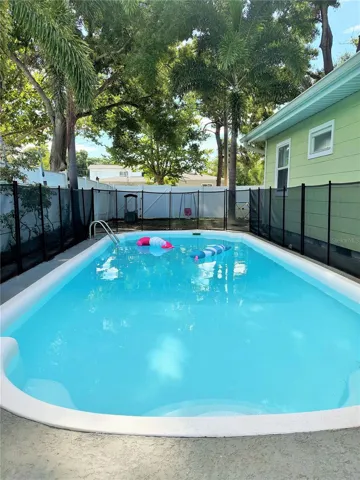 Imagine jumping into this beautiful pool after a long day at work.