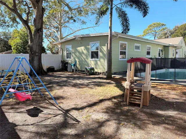 This backyard has plenty of room to spread out.