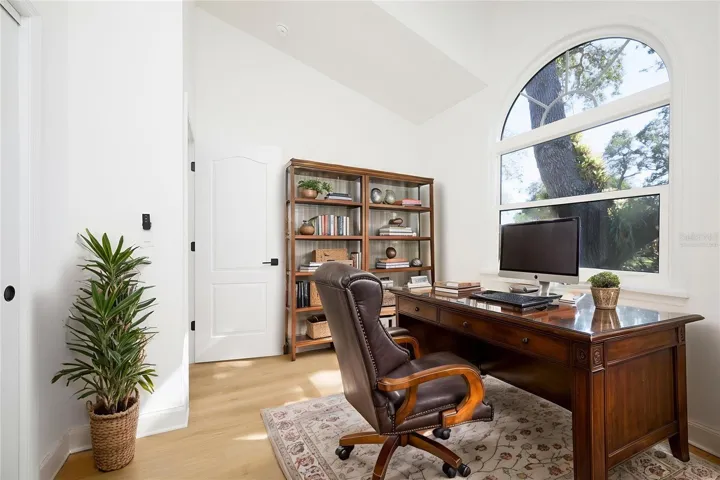 Office with closet (5th bedroom) on first level.  Virtually Staged.