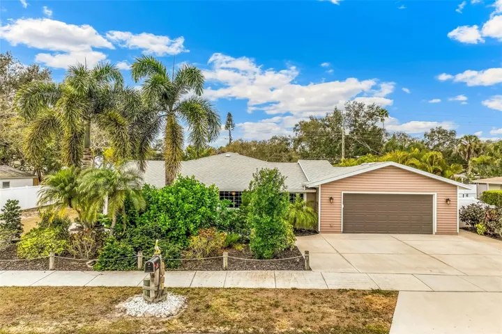 Exterior of the home with In-Law Suite on the left side with separate entrance