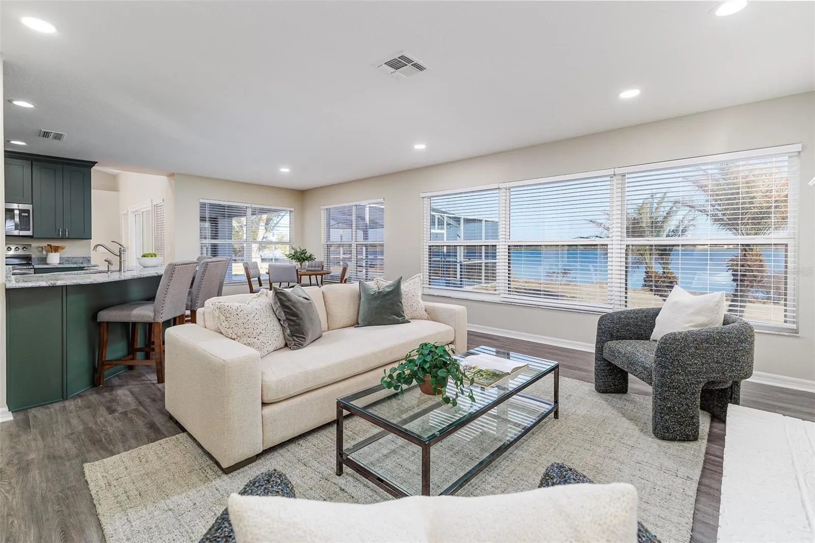 Family Room with Lake  and Pool View