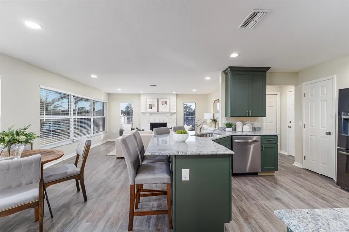 4 Seat Breakfast Bar, Eat in Area and Family  Room with Fireplace with Lake Views