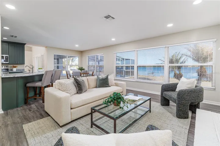Family Room with Lake  and Pool View