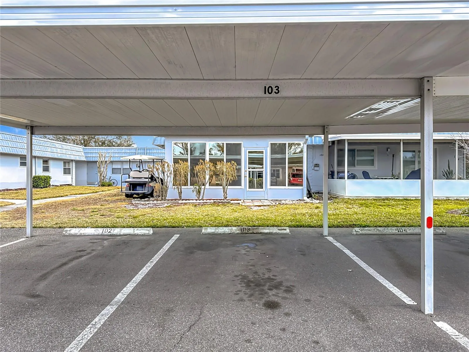 Covered parking in front of unit