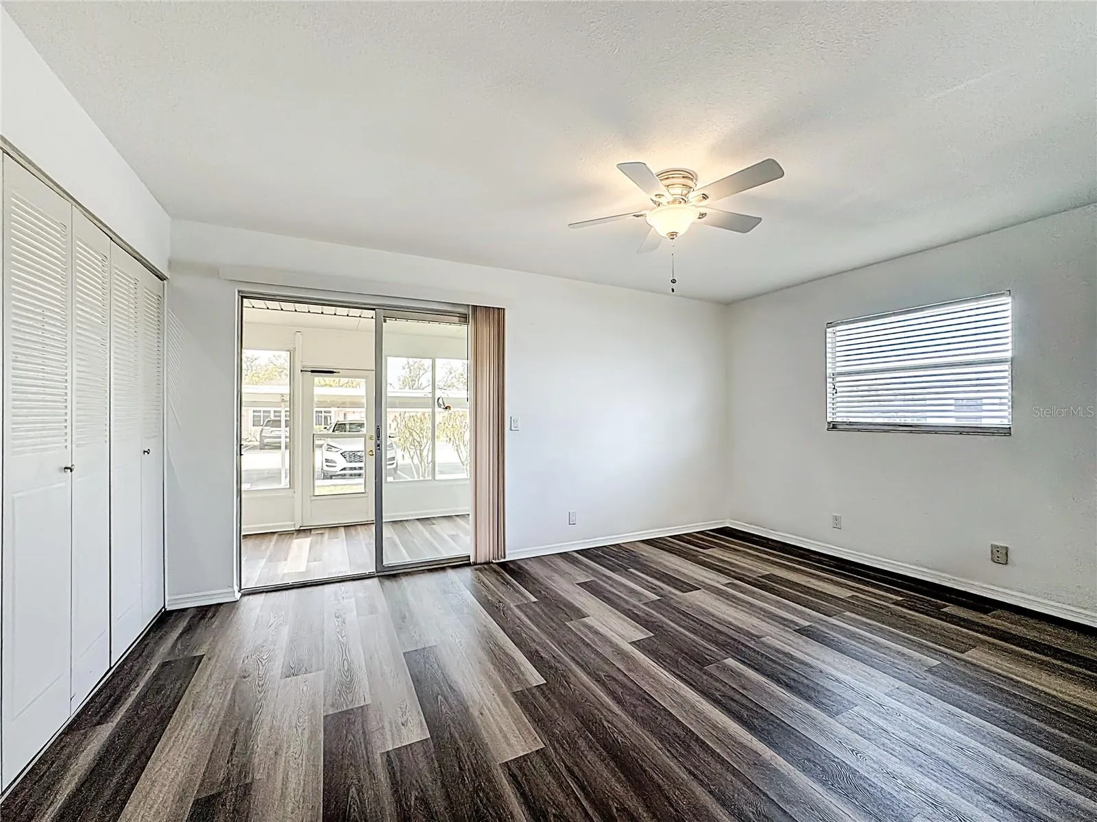 BEDROOM, SLIDERS TO FLORIDA ROOM