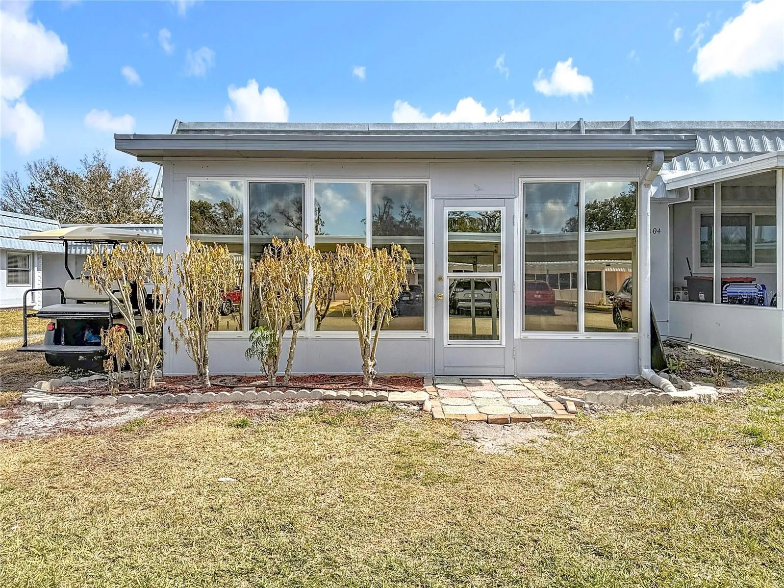 GLASSED FLORIDA RM WITH BACK DOOR