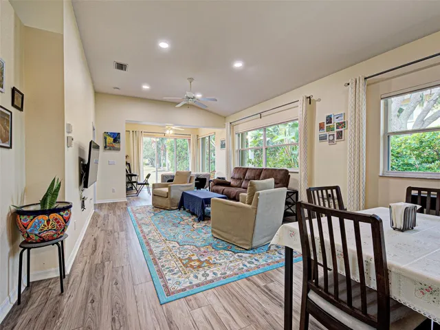 The living/dining area is open to the back of the home.