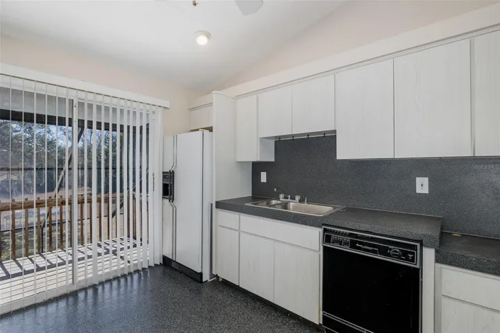 Second level, full-kitchen with balcony.