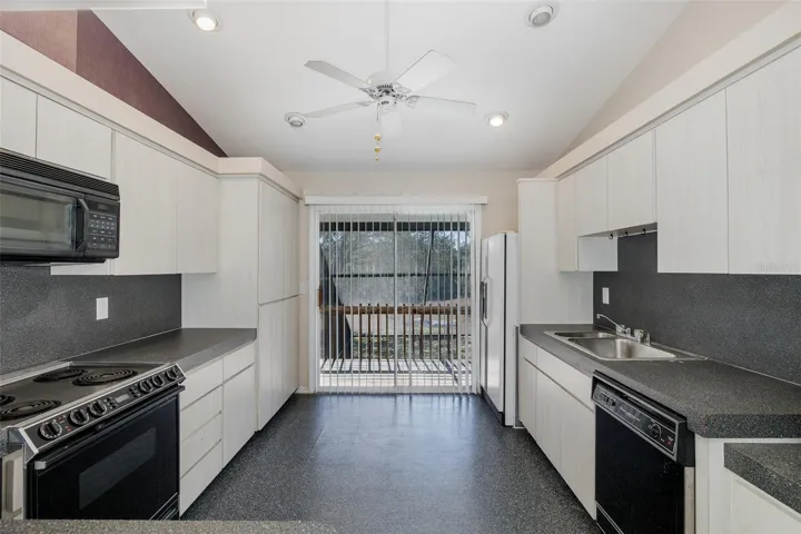Second level, full-kitchen with balcony.