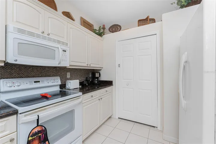Kitchen has a closet pantry!