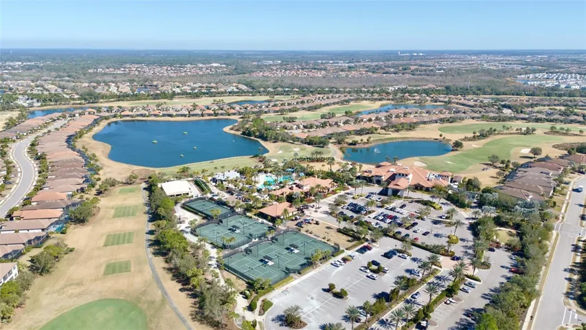 Esplanade Country Golf and Country Club amenities include tennis, culinary center with Barrell House Bistro Bar and the casual Bahama Bar  near the resort style pool, spa, salon, and golf pro-shop, driving range.  Golf membership not required with this home.