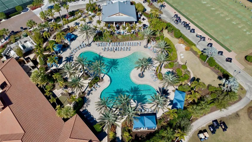Esplanade Golf &amp; Country Club Resort style pool, clubhouse and Bahama Bar.