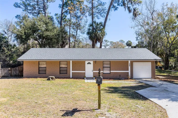 This cozy home is situated on a large corner lot that is almost 1/3 of an acre.  There are woods are across both streets which provides privacy.