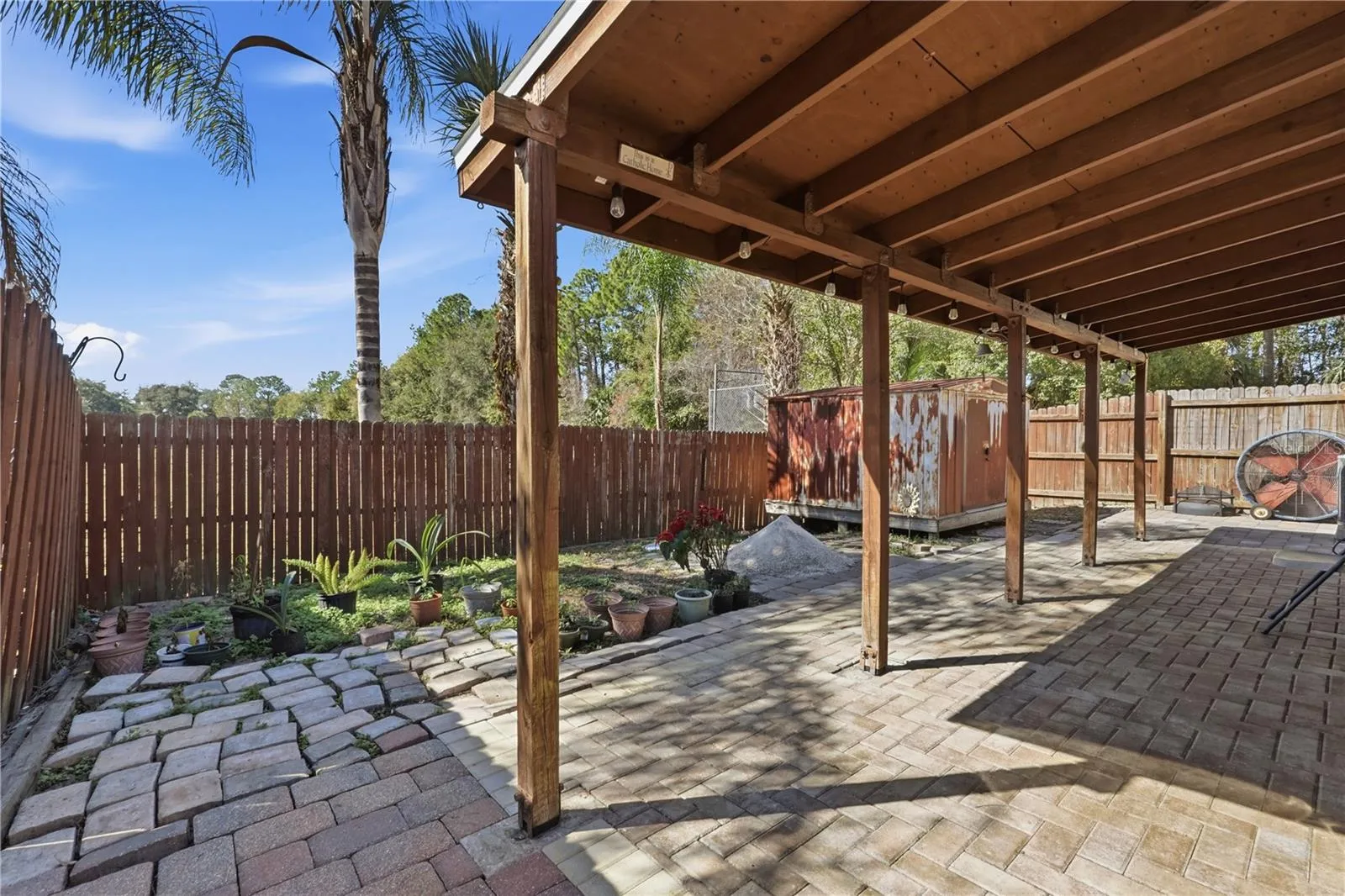 Pavers are being finalized. Large shed freshly painted, no leaks-in excellent condition.