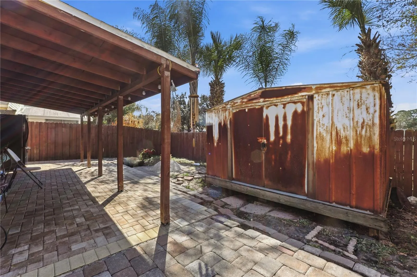 Pavers are being finalized. Large shed freshly painted, no leaks-in excellent condition.