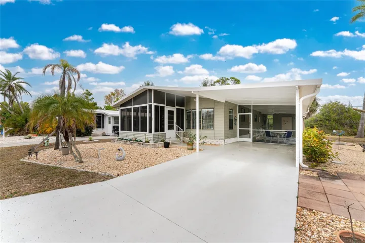 Beautifully Maintained Manufactured Home with Carport